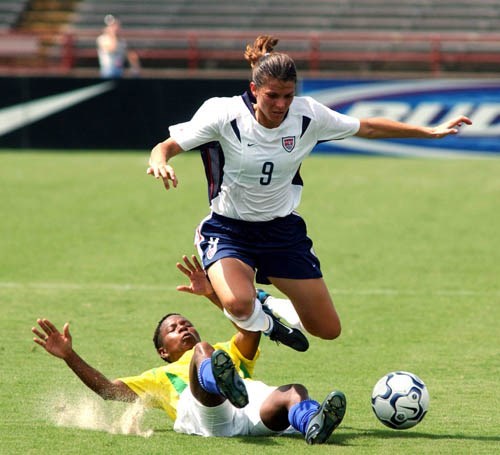 Hamm passes brazil player and heads to the goal (http://www.davidraemorris.com/mia.html ())