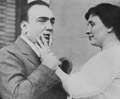 Helen uses her hand to hear Enrico Caruso talk. (http://www.greatamericanthings.net/people/person-helen-keller/ ())