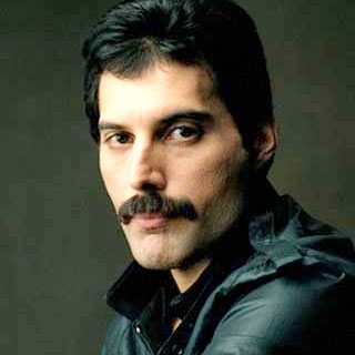 Freddie Mercury posing for the camera (http://www.cracked.com/funny-1666-freddie-mercury/ ())