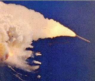 The Challenger blowing up during its test flight. (http://www.big13.net/Satellite%20Era%20Jim%20West/wtvt_satellite_news_9.htm (WTVT Satelite News 9))