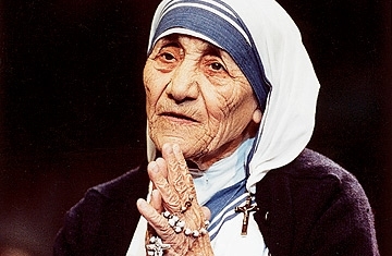Mother Teresa is praying to God.  (http://www.time.com/time/world/article/0,8599,1668 (David Van Biema))