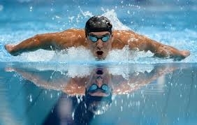 Phelps with his gold medals (Google Images  ())