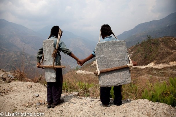"Brothers Carrying Stone, Nepal" (Photo by <a href=http://www.lisakristine.com/lisa-kristine-receives-2013-lucie-humanitarian-award/>Lisa Kristine</a>)