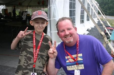 Patrick with a camper (Camp Ta-Kum-Ta)