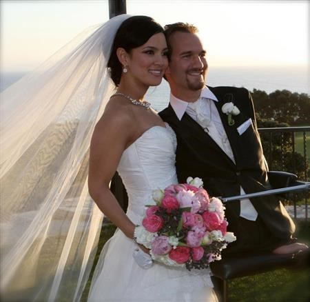 Nick and wife at wedding. (http://photography.ratishnaroor.com/tag/nick-vujic (Ratishnaroor Photography))