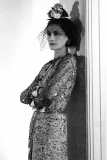 Coco in her beautiful designed dress (http://www.vogue.co.uk/person/coco-chanel ())
