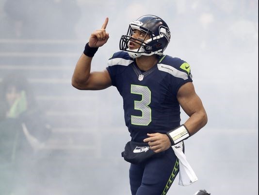 Russell Wilson giving God glory 
