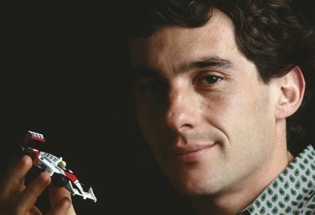 Ayrton Senna Holding A Model Of His Mclaren MP4/4 (http://en.wikipedia.org/wiki/Ayrton_Senna)