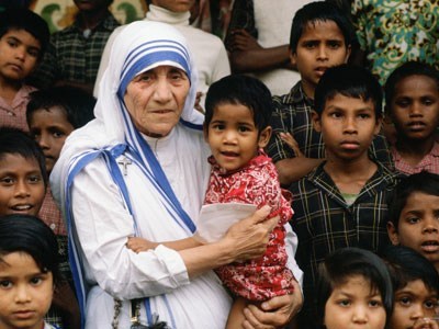 Mother Teresa caring for children living in India. (http://www.catholicleague.org/ ())