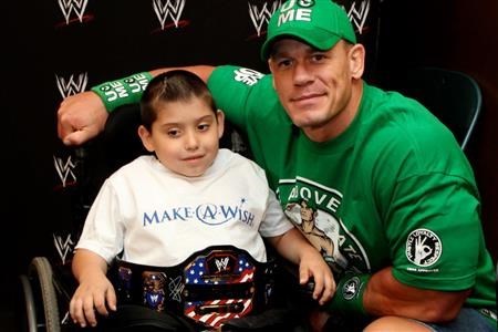 John Cena with a sick fan. (NYPost)