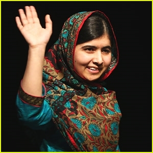 Malala waving at the Library of Birmingham. ((https://www.google.com/url) ((https://www.google.com/url)))