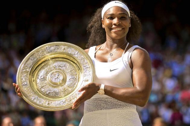 Serena Williams holding her medal (Safari  (Google images))