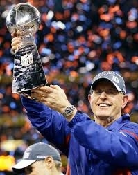 Tom Coughlin holding high the Lombardi trophy (Syracuse.com (AP))