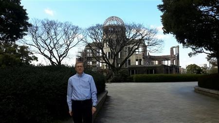 Thomas Johnson in front of the gates of Fukushima