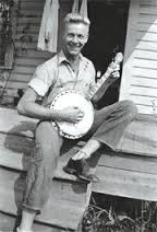 Joe Rantz playing his banjo on his deck (northwestprimetime.com (Judith Willman))