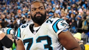 Michael Oher playing in a NFL football game (abcnews.go.com (abcnews.go.com))