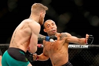McGregor Knocks out Aldo for Featherweight belt ( http://www.independent.ie/sport/mma/video-ufc-own ())