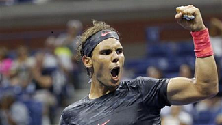 Spain's Rafael Nadal celebrates after winning a po (http://www.rediff.com/sports/report/us-open-photos-pix-serena-williams-scripts-ruthless-win-djokovic)