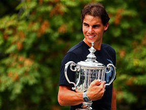 Rafael Nadal poses with the US Open trophy in New  (http://www.theaustralian.com.au/sport/the-times-sport/rafael-nadal-shows-a-refusal-to-lose-with-us-o)