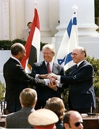 Jimmy Carter at mediation Camp David Accords (http://www.cmiconcord.com/wp-content/images/campda ())