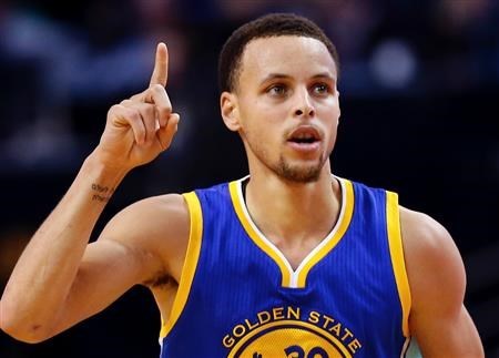 Curry gives credit to God after he made a shot. (blacksportsonline.com )