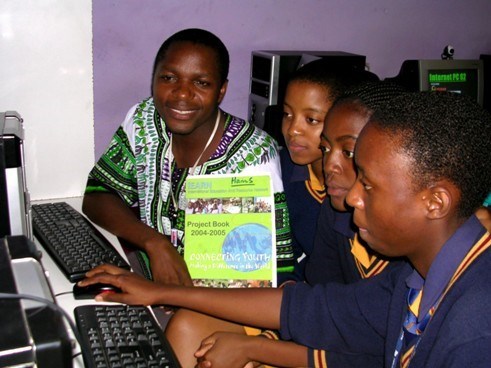 Tommie working with his students in Botswana.
