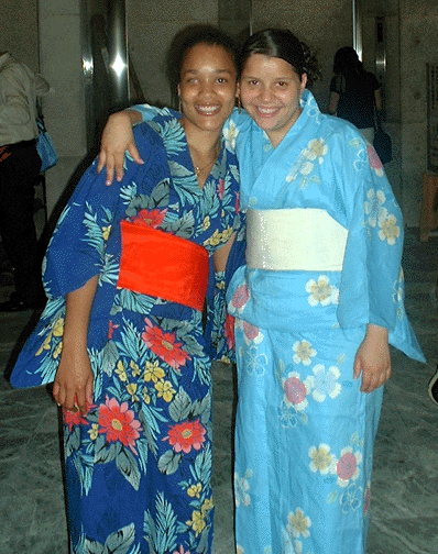 Nuria (left) and fellow Youthcaner, pose at the iEARN 2003 conference in Japan.
