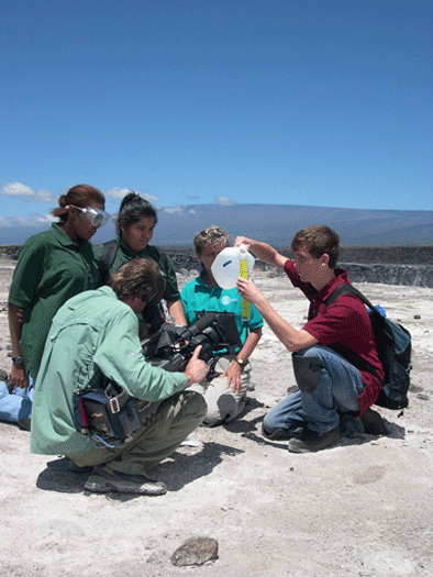 <h6>JASON Argonauts (R to L) Talicia Calhoun, Anabel Hernandez, teacher Marti Dekker, and Luke Iott test a soil sample at Hawai`i Volcanoes National Park.  <p> </h6>