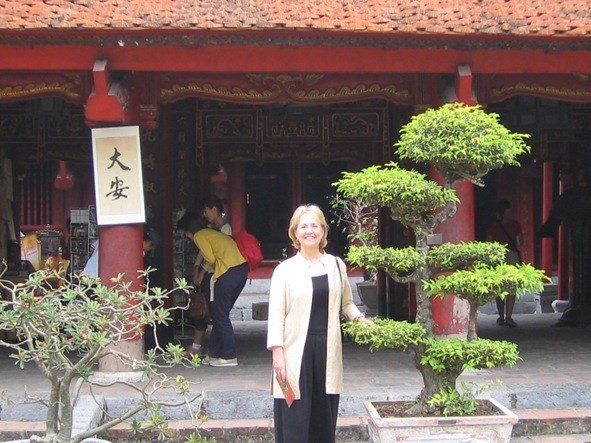 In front of the Temple of Learning in Hanoi, Vietnam, where Ann was working with AIDS orphans.