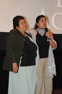 Erica Fernandez (right) gives her acceptance speech alongside her mother, after she is awarded the Eldon Activist Award