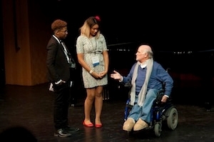 Ron Kovic with Queen McElrath and Aniea Cody, High School students from Nashiville who directed and performed HANDS UP DON'T SHOOT