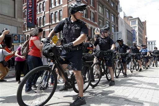 Law enforcement with bikes, patrol in downtown Cleveland on Tuesday, July 19, 2016, during the second day of the Republican convention. (AP Photo/John Minchillo)