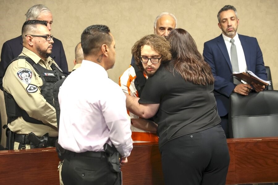 Picture of Hugs of mercy in a Texas courtroom