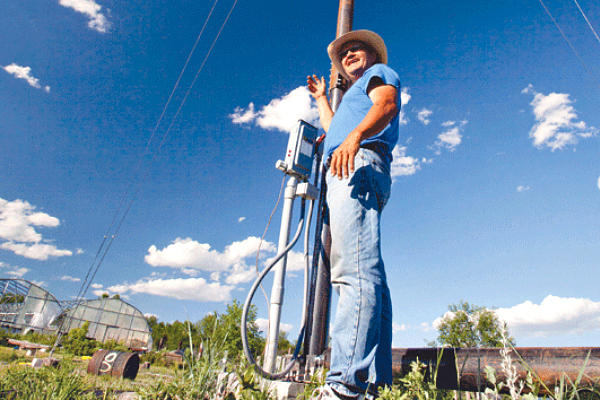 Henry Red Cloud directs the work of Lakota Solar Enterprises, his American Indian-owned and operated business dedicated to providing renewable energy to some of the poorest communities in the United States.  <P>Photo by Dan Bihn