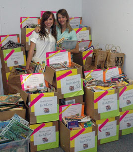 Chelsey Barrios, left, Kirsten Jerzyk, and their classmates collected 4,179 books for Read to Grow