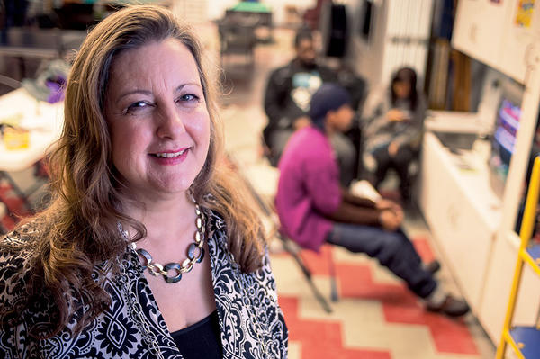 Lisa Fitzpatrick, executive director of the APEX Youth Center in New Orleans, stands in the center’s recreation area.  <P>Ann Hermes/Staff