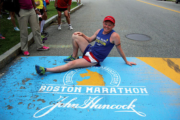 Danny Bent poses at the starting line of the Boston Marathon in Hopkinton, Mass. He is co-founder of One Run for Boston, a charity relay race that takes runners across the US and benefits victims of the 2013 Boston Marathon bombings.  <P>Courtesy of Danny Bent/One Run for Boston