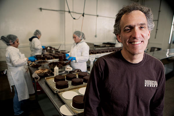 Andrew Stoloff stands in the kitchen of Rubicon Bakery where he employs released prisoners and economically disadvantaged workers.  <P>Melanie Stetson Freeman/Staff