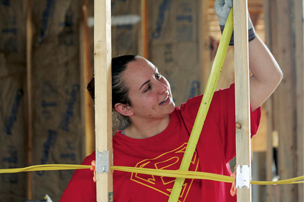 Brittany Aydelotte works on a house in New Orleans. She first traveled to the city as a student at The College of New Jersey in Ewing shortly after hurricane Katrina hit. She has since returned on her own 10 times, leading student service trips. <P>David Karas