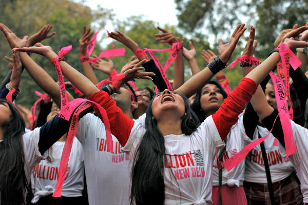 Women and men dance to the theme song of the 'One Billion Rising' campaign in New Delhi last February. One Billion Rising is a global coordinated campaign calling for an end to violence against women and girls, according to its organizers.  <P>Mansi Thapliyal/Reuters