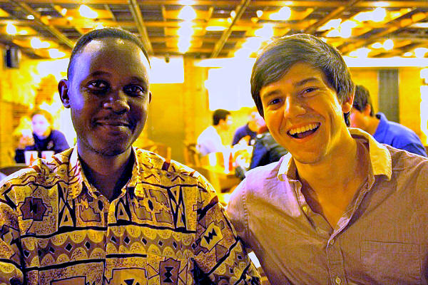 Teach Twice East Africa regional director Paul Kabanda (left) and co-founder Trevor Burbank: Kabanda found the story, writer, and illustrator in Uganda for the social venture's first book.  <P>Kenneth Khoo