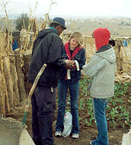 <center>Claire Reid conducted trials for her 'real gardening' concept with the help of the Diepsloot community<br>http://www.joburg.org.za/2003/aug/aug19_sweden.stm</center>