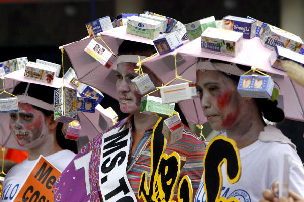 Environmental activists dressed as what they called 'toxic beauties' protest against unsafe cosmetics during a demonstration in Manila, The Philippines, last year. The activists donned umbrella hats with boxes of recalled skin bleaching products to dramatize the health effects caused by the use of hazardous cosmetics such as mercury-laced skin whitening creams, according to the organizers.  <P>Romeo Ranoco/Reuters/File