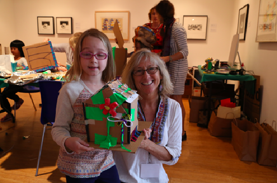 MY HERO’s Media Arts Director Wendy Milette with a future architect and her solar powered house