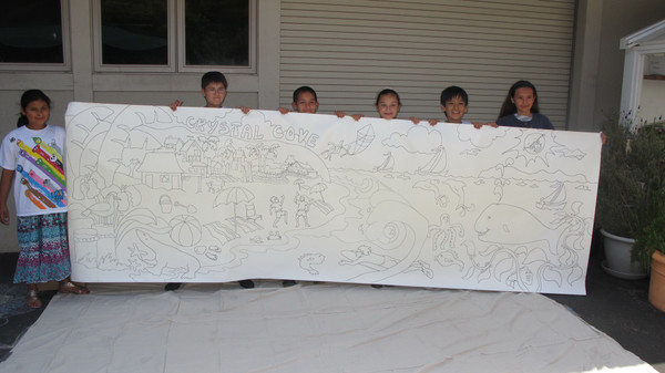 Students at the Laguna Beach Boys and Girls Club hold up the mural they painted drawn by Robin Altman <P>(Photo courtesy of Robin Wethe Altman)
