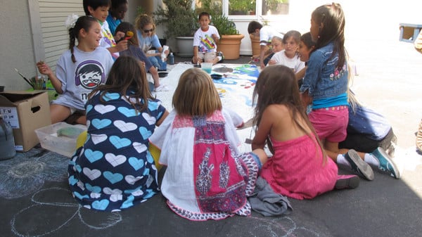Laguna Beach Boys and Girls Club Art Director Emily and her students paint the wonderful Robin Altman mural <P>(Photo courtesy of Robin Wethe Altman)