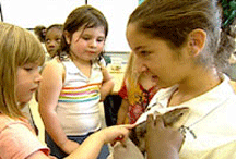 Seventh graders delight in sharing their knowledge of local animals with younger students. Photo from The George Lucas Educational Foundation