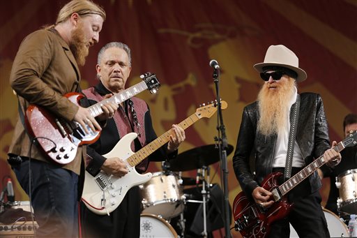 The Tedeschi Trucks Band with special guests Billy F. Gibbons, right, and Jimmie Vaughan, back left, play on the Acura Stage at Jazz Fest on Thursday, April 28, 2016 in New Orleans. (Chris Granger/NOLA.com The Times-Picayune via AP)