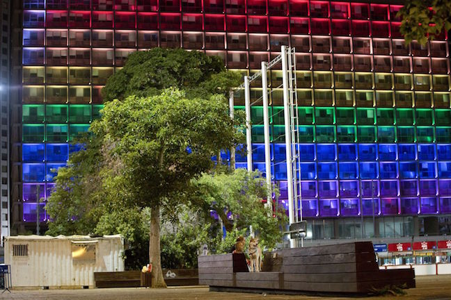 Tel-Aviv city hall lit up with rainbow flag colors in solidarity with Florida's shooting attack victims, in Tel Aviv, Israel, Sunday, June 12, 2016.  Oded Balilty,/AP