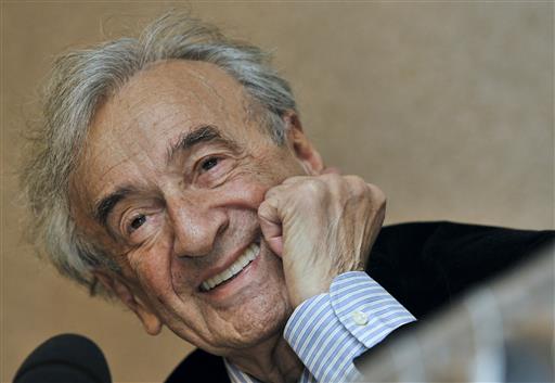 In this Dec. 10, 2009 file photo, Elie Wiesel smiles during a news conference in Budapest, Hungary. Wiesel, the Nobel laureate and Holocaust survivor has died. His death was announced Saturday, July 2, 2016 by Israel's Yad Vashem Holocaust Memorial. (AP Photo/Bela Szandelszky, file)